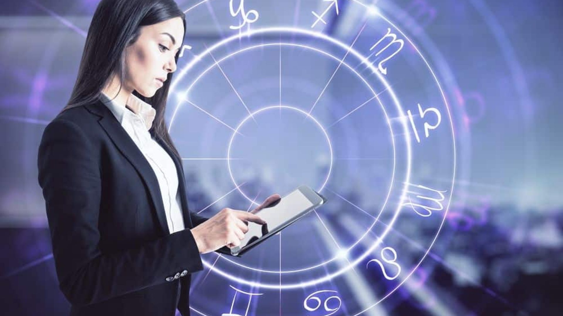 Attractive young european businesswoman with tablet and abstract astrological wheel hologram on blurry office interior background. Business forecasting and future concept. Double exposure